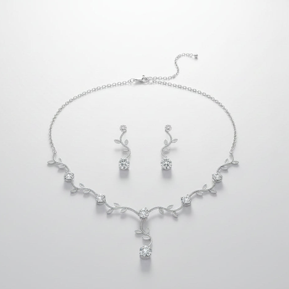 ZAKOL bridal jewelry set featuring leaf-shaped cubic zirconia choker and water drop earrings