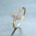 Huitan exquisite wedding ring with marquise cubic zirconia and gold-tone engagement band