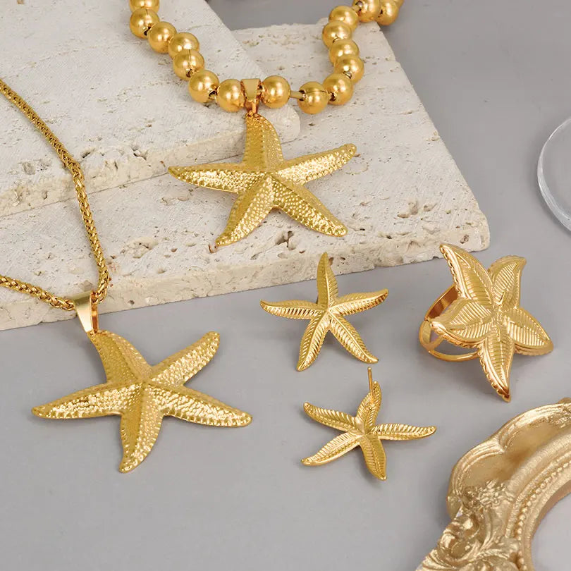 Stainless Steel Ocean Series starfish jewelry set with pendant, earrings, and ring in punk style