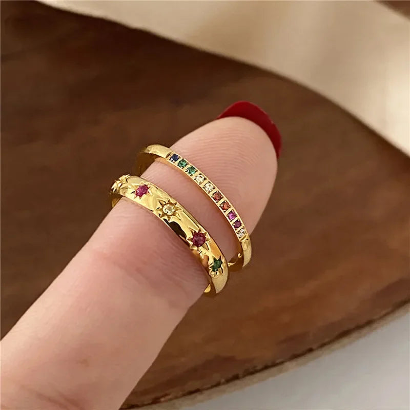 Set of 2 stainless steel rainbow color finger rings with cubic zirconia stones and gold waterproof plating for women