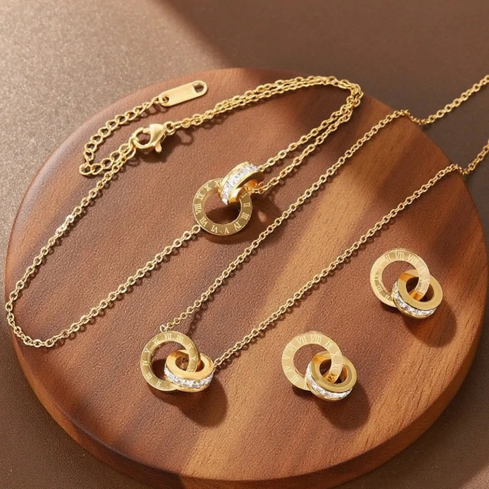 Women's classic stainless steel jewelry set with Roman numerals necklace, bracelet, and earrings